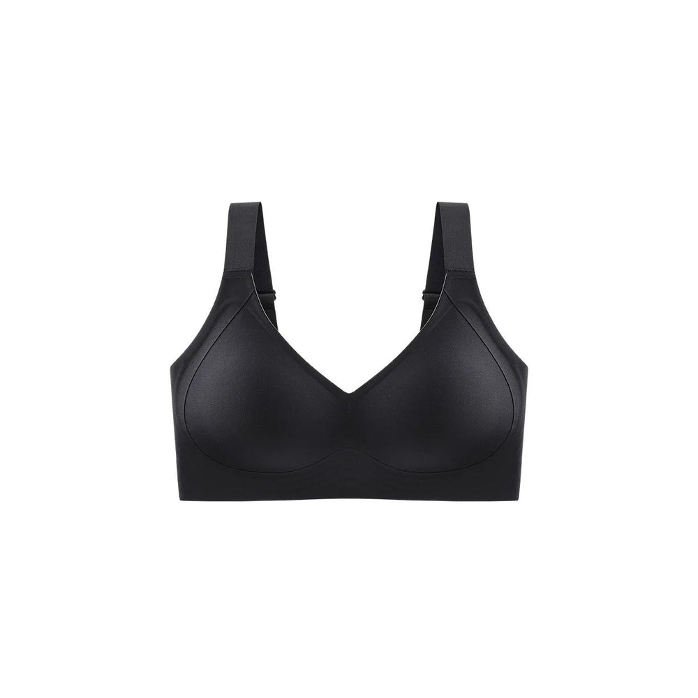The Everyday Lift in Black: wireless, seamless, nothing to show under a dark top.