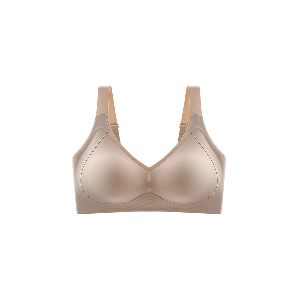 The Everyday Lift in Sand: wireless, seamless, wide straps and a wide band. No wire to dig in.